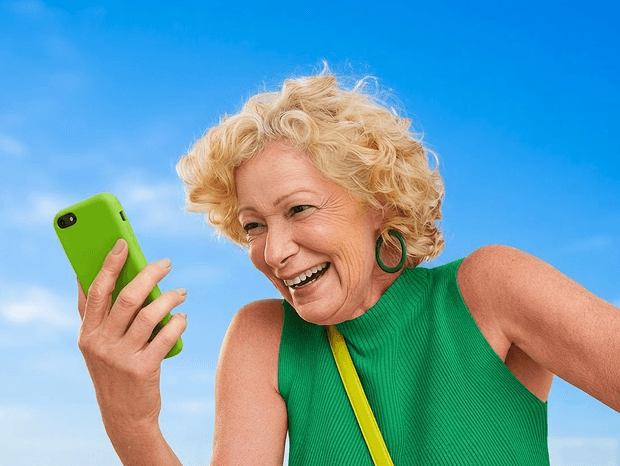 Person looking amazed at phone